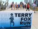 Calgarians run over the George C. King bridge as they participated in the 2019 Terry Fox Run along the Bow River pathway on Sunday September 15, 2019. Over $200,000 for cancer research was raised at this year's event. Gavin Young/Postmedia