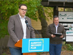 Parks Minister Jason Nixon (L) and Alberta Premier Jason Kenney and are pictured at Fish Creek Park in front of the Friends of Fish Creek building in Calgary during a press conference on Tuesday, September 15, 2020.
