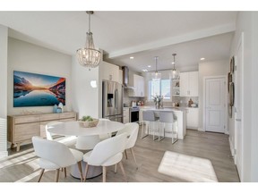 The dining area in the Magnolia Corner, a townhome by Trico Homes in Riversong, Cochrane.
