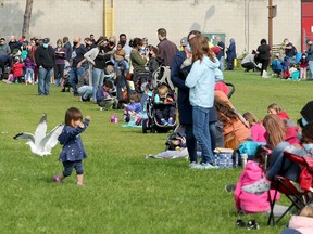 Hundreds of families with children wait in long lineups outside a COVID-19 testing centre in Ottawa's Brewer Park on Sept. 16, 2020.