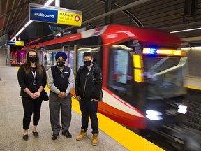 Shayla Kuefler, right, met Calgary Transit CTrain operator Gurmeja Cheema and call centre representative Brooke Richmond after the two transit employees were quickly able to find the $1500 in cash that Kuefler inadvertently left behind in a bag on a train.The money was a critical rent payment for Kuefler who is currently on AISH. The trio were photographed a the Westbrook CTrain station on Tuesday, September 15, 2020.