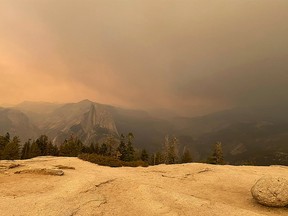 Smoke from the Creek Fire settles over Glacier Point in Yosemite National Park, California, U.S., on Saturday, Sept. 5, 2020.