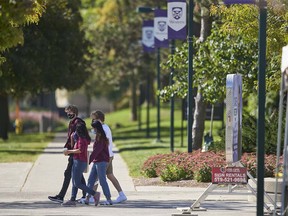 CP-Web.  Students walk across campus at Western University in London, Ont., Saturday, Sept. 19, 2020.