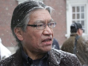 Edmund Metatawabin, a survivor of St. Anne's residential school in Fort Albany, is seen outside Osgoode Hall in Toronto on Tuesday, Dec. 17, 2013. Metatawabin remembers being placed in an electric chair at the school.