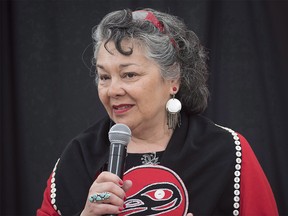 CP-Web.  Joan Jack speaks to the commissioners at the National Inquiry into Missing and Murdered Indigenous Women and Girls taking place in Whitehorse, Yukon, Thursday, June 1, 2017. An Indigenous lawyer has filed a lawsuit against the firm that represented survivors of Indian day schools alleging she was not compensated for years of her work on the class-action case.