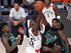 Boston Celtics guard Jaylen Brown blocks a shot by Toronto Raptors forward Pascal Siakam during game two of their NBA playoff series, Sep. 1, 2020.