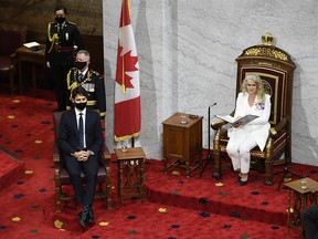 Prime Minister Justin Trudeau listens as Gov.Gen Julie Payette delivers the Speech from the Throne at the Senate of Canada Building in Ottawa, on Wednesday, Sept. 23, 2020.