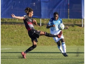 Canadian Premier League - HFX Wanderers vs Cavalry FC - Charlottetown, PEI- Sept 12, 2020]. Cavalry FC #21 Mohamed Farsi receives a pass