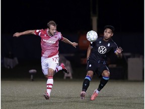 Canadian Premier League - Pacific FC vs Cavalry FC - Charlottetown, PEI- Sept 9, 2020]. Cavalry FC #17 Nico Pasquotti chases the ball down. (CPL/Chant Photography)