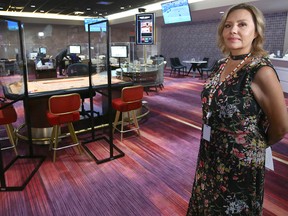 Tammy Whitney, resort executive at Grey Eagle, poses in a gaming room at the Grey Eagle Casino in Calgary on  Wednesday, Sept. 9, 2020. The casino has reopened table games with enhanced cleaning and physical distancing.