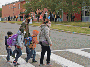 Students head back to school in Calgary on Sept. 2, 2020. It was the first day of staggered re-entry for the Calgary Catholic School Division amid the COVID-19 pandemic.