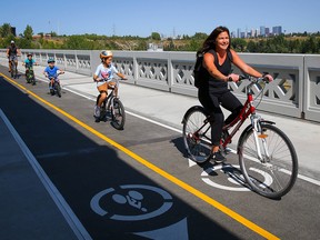 Cyclists and pedestrians were delighted to be back on the Glenmore Dam pathway after it reopened Friday, Sept. 4, 2020.