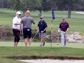 Golfers are seen enjoying the links at Elbow Springs Golf Club on Saturday, Sept. 19, 2020. Brendan Miller/Postmedia