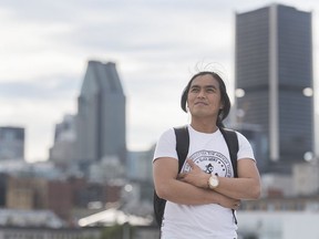 Resig Calanog, a sailor from the Philippines poses while on shore leave in the Old port of Montreal, Thursday, Sept. 3, 2020. Calanog's walk around Montreal's port is only the second time in nine months he's been on solid ground. Even for a career ship worker, it's a lot of time at sea. But as for when he'll be able to walk in his homeland in the Philippines, and see his three children, that remains uncertain.