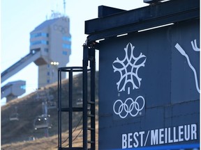 The 1988 Winter Olympics logo and rings mark the score board for the sliding track at Canada Olympic Park on Monday, October 29, 2018. A potential Calgary bid for the 2026 games seemed in jeopardy over funding commitments.  Gavin Young/Postmedia