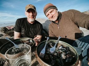 Chef Paul Rogalski, left, with TV host Les Stroud.

Fpr Chorney Booth