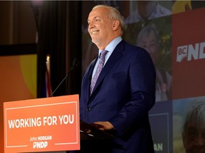 B.C. NDP leader John Horgan speaks at the party's provincial election night headquarters following a majority government win in Vancouver, British Columbia, Canada October 24, 2020.