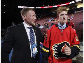 VANCOUVER, BRITISH COLUMBIA - JUNE 22: Dustin Wolf reacts after being selected 214th overall by the Calgary Flames during the 2019 NHL Draft at Rogers Arena on June 22, 2019 in Vancouver, Canada.