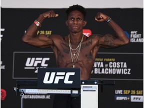 ABU DHABI, UNITED ARAB EMIRATES - SEPTEMBER 25: In this handout image provided by UFC,Hakeem Dawodu of Canada poses on the scale during the UFC 253 weigh-in on September 25, 2020 at Flash Forum on UFC Fight Island, Abu Dhabi, United Arab Emirates.