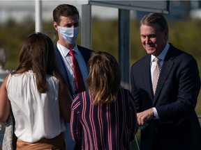 U.S. Senator David Perdue (R-GA) greets supporters at a campaign rally on October 16, 2020 in Macon, Georgia. President Trump continues to campaign against Democratic presidential nominee Joe Biden with 18 days until election day.