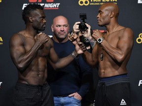 Uriah Hall (left) and Anderson Silva face off during the UFC Fight Night weigh-in at UFC APEX on Oct. 30, 2020 in Las Vegas.