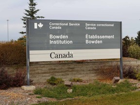 FILE - Exterior photo shows sign at main entrance at Bowden Institution at Bowden, AB about 100 km north of Calgary.