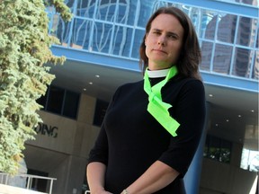 Anna Greenwood-Lee with Keep Calgary Strong poses for a photo outside City Hall on Tuesday, July 23, 2019. Brendan Miller/Postmedia