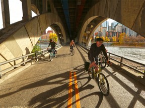 Cyclists take advantage of one of the last weekends to use the lower deck of the Centre Street Bridge on Saturday, October 10, 2020. The City of Calgary will soon be ending the lane closures that have been used to help with physical distancing during the COVID-19 pandemic. The Centre Street Bridge lower deck and the eastbound lanes of Memorial Drive have been closed on weekends.