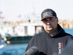 Chief Mike Sack of the Sipekne'katik First Nation speaks with the media in front of the Saulnierville Harbour, in Saulnierville, Nova Scotia, Canada October 18, 2020. Non-native commercial fishermen have been protesting against an Indigenous lobster fishery. Picture taken October 18, 2020.