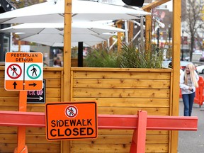 Temporary patios on 17th Avenue S.W. will be able to operate until the forecast calls for two centimetres of snow, but elsewhere the City of Calgary will be ending temporary lane closures will soon be removing most of the lane closures put in place for physical distancing along popular walking and cycling routes.
