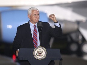 Vice-president Mike Pence addresses supporters at a campaign rally Saturday, Oct. 24, 2020, in Tallahassee, Fla.