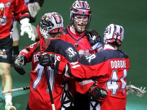 The Calgary Roughnecks celebrate during a game against the San Diego Seals at the Saddledome in Calgary on Feb. 29, 2020.