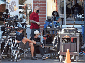 Film crew production staff wear masks as they conform to new pandemic safety rules and regulations for the movie industry in British Columbia this summer. The crew were filming a movie called Deliver By Christmas.