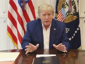 U.S. President Donald Trump, who is being treated for the coronavirus disease (COVID-19) in a military hospital outside Washington, speaks from his hospital room, in this still image taken from a video supplied by the White House, October 3, 2020.