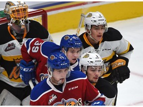 Edmonton Oil Kings Tomas Soustal (11) and Ty Gerla (39) with Brandon Wheat Kings Schael Higson (5) and Braden Schneider (2) all lined up in front of goalie Logan Thompson during WHL action at Rogers Place in Edmonton, October 6, 2017. Ed Kaiser/Postmedia Photos for stories running Saturday, Sept. 23 edition.