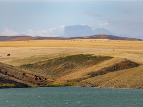 Chief Mountain rises behind Jensen Reservoir on the Milk River Ridge south of Magrath, Ab., on Tuesday, October 6, 2020.