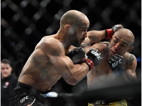 Dec 14, 2019; Las Vegas, NV, USA; Marlon Moraes (red gloves) fights Jose Aldo (blue gloves) during UFC 245 at T-Mobile Arena. Mandatory Credit: Stephen R. Sylvanie-USA TODAY Sports ORG XMIT: USATSI-408330