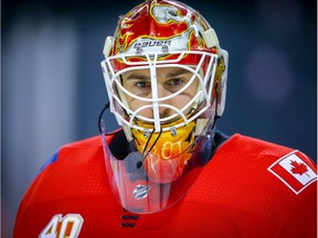 Calgary Flames goalie Cam Talbot during warm-up before facing the Arizona Coyotes during NHL hockey in Calgary on Friday March 6, 2020. Al Charest / Postmedia