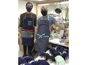Andrew Dallman, left, and Cam Dobransk, owners of Medium Rare Chef Apparel, at their Calgary plant.