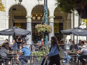 A restaurant patio does brisk business during lunch on Stephen Avenue, Monday, Oct. 5, 2020.