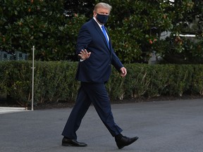 U.S. President Donald Trump walks to Marine One prior to departure from the White House in Washington, DC, Oct. 2, 2020. Trump will be taken to Walter Reed Military Medical Center for treatment for COVID-19.