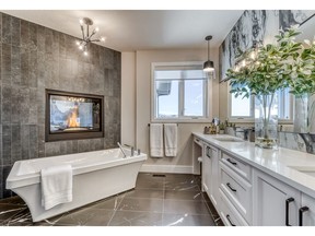 The master ensuite in the modified Kimberly show home by Homes by Us in Timberline Estates.