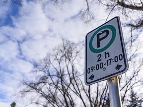 Pictured is a parking sign in Calgary on Tuesday, October 20, 2020.