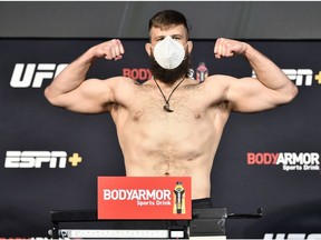 LAS VEGAS, NEVADA - JUNE 26: In this handout image provided by UFC, Tanner Boser poses on the scale during the UFC weigh-in at UFC APEX on June 26, 2020 in Las Vegas, Nevada.