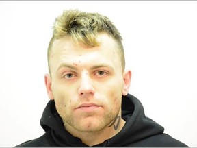 Michael Andrew Onischuk, 33, is wanted on a Canada-wide warrant for murder, according to Calgary police.