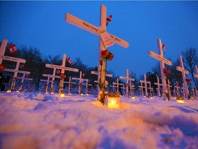 For the second year the Field of Crosses hosted a Night of Lights with volunteers placing thousands of candles at the base of the crosses on Tuesday, November 10, 2020. 

Gavin Young/Postmedia