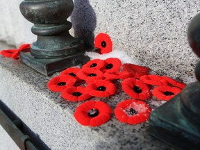 Calgarians placed their poppies on the cenotaph in Central Memorial Park on Remembrance Day Wednesday, November 11, 2020. The COVID-19 pandemic meant large public gatherings were not permitted.

Gavin Young/Postmedia