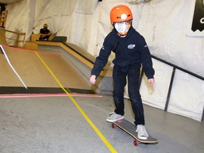 14 year-old Gabriel Pigeon, a member of the "Skate Bats" is seen riding his skateboard at The Compound skatepark. The team of visually impaired and blind skateboarders use high contrast markings, LED light guidelines, audio beacons and tactile strips along ramps and the ground to help guide them on their skateboards.