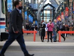 Calgarians wear masks in the downtown area on Tuesday, November 3, 2020.