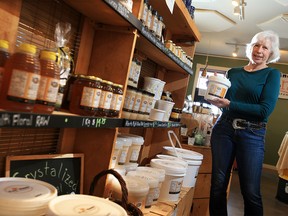 Chinook Honey Company owner Cherie Andrews was photographed in her store just outside Okotoks on Tuesday, November 17, 2020. Andrews is one of 24 Okotoks restaurants and food companies that have created an owner-operated delivery company to combat companies like Skip the Dishes and Uber Eats.
